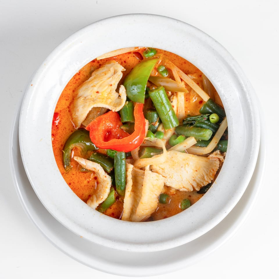 Simply Asian Thai Restaurant's red curry with chicken, green beans, bamboo shoots, and bell peppers.